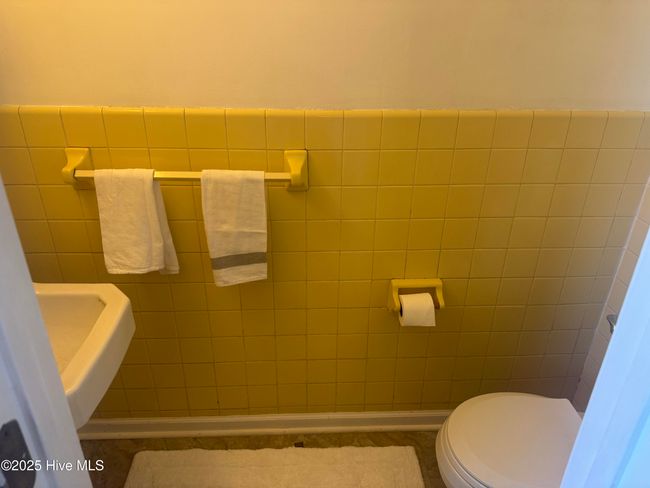 Powder room next to Mud room | Image 37