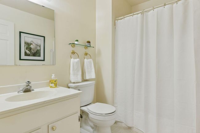 Full bathroom with a clean, functional layout and ample storage for everyday essentials | Image 8