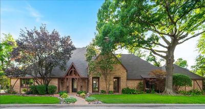 View of front facade with a front yard | Image 1