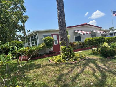 6399 S Ash Lane, House other with 2 bedrooms, 2 bathrooms and null parking in Lantana FL | Image 1