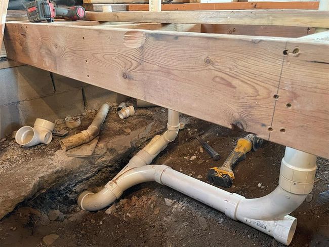 Plumbing Rough complete under house, photo showing how much detail went into the basic plumbing *older photo | Image 29