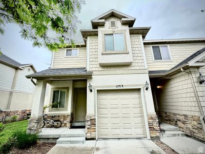 View of front of property featuring a garage | Image 1