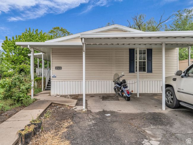 View of front of house with an attached carport | Image 24