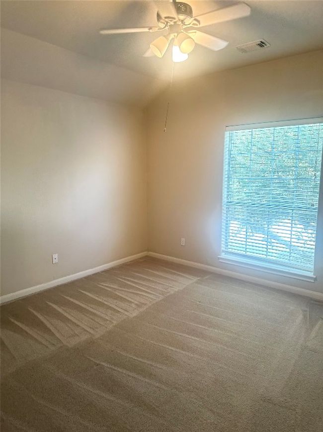 Empty room featuring carpet floors and a ceiling fan | Image 11
