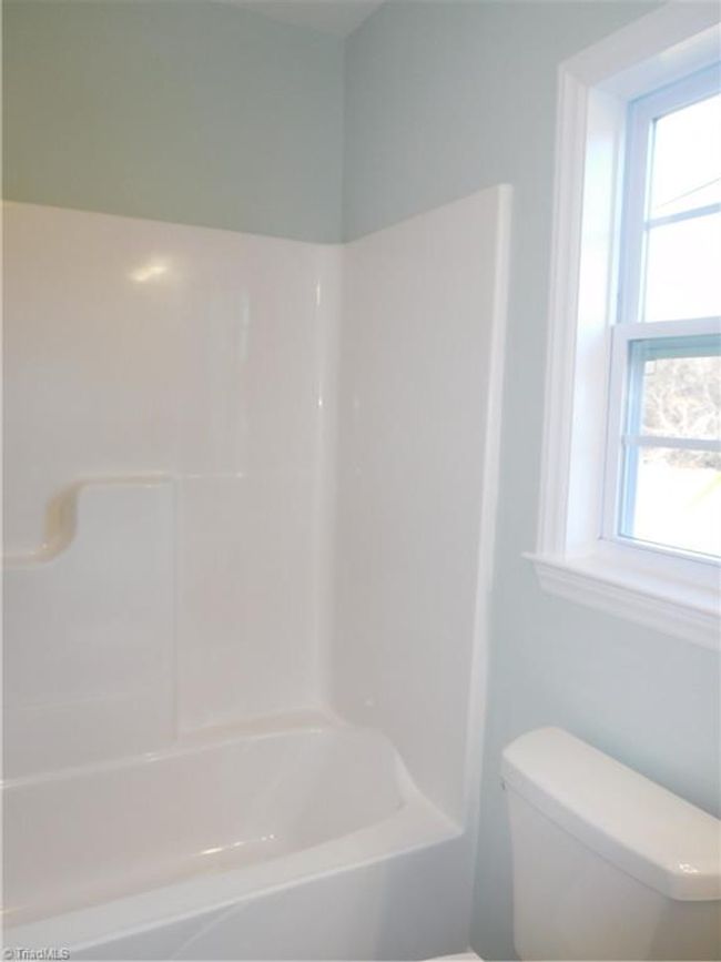 Hall Bathroom also has a window for more natural light. | Image 24