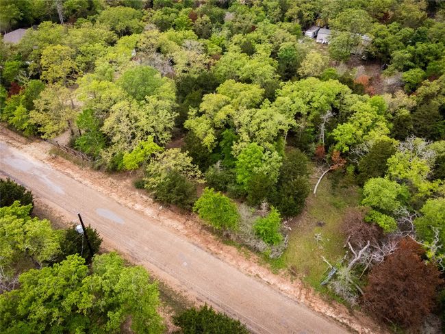 Birds eye view of property with a view of trees | Image 4