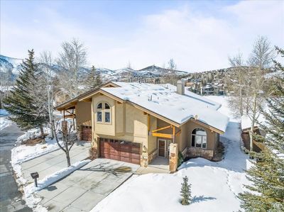 View of front of property with a mountain view and a garage | Image 3