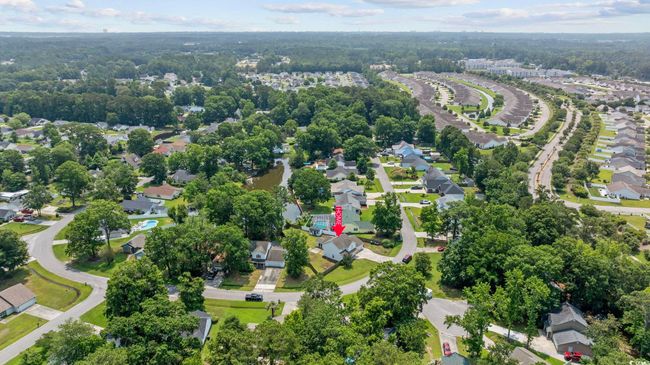 Aerial view of property's location featuring nearby suburban area | Image 7