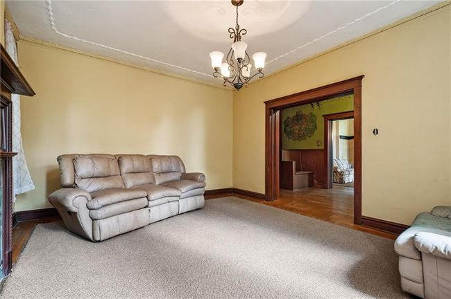 Spacious Main Floor Living Room with Pocket Doors | Image 16
