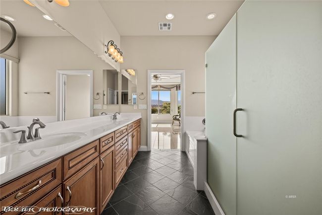 Full bath with a sink, visible vents, double vanity, and recessed lighting | Image 46