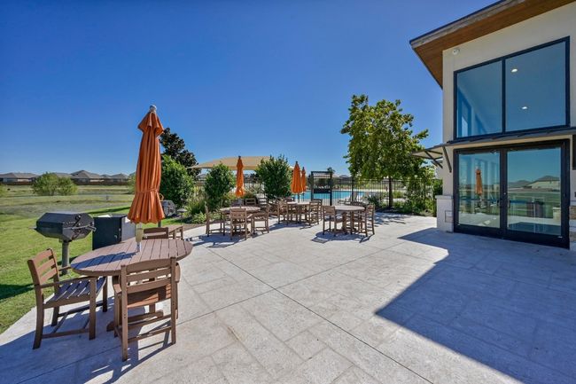 ...outdoor patio area with built-in grills... | Image 34