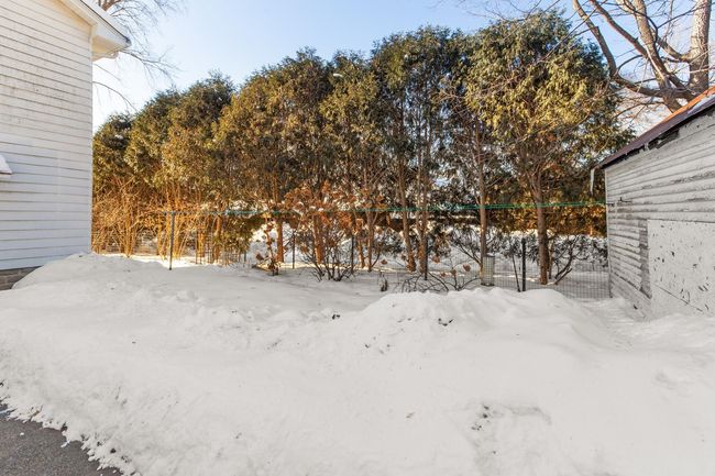 11212 W River Road, House other with 4 bedrooms, 3 bathrooms and null parking in Champlin MN | Image 44