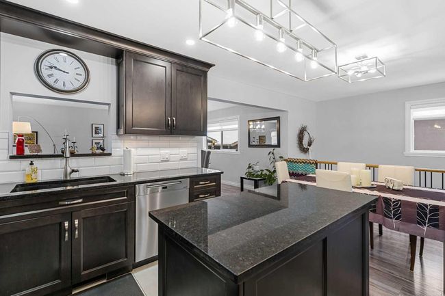 323 Alcott Cres Se, House other with 5 bedrooms, 3 bathrooms and 2 parking in Calgary AB | Image 6