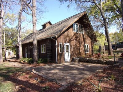 View of property exterior with a patio | Image 3