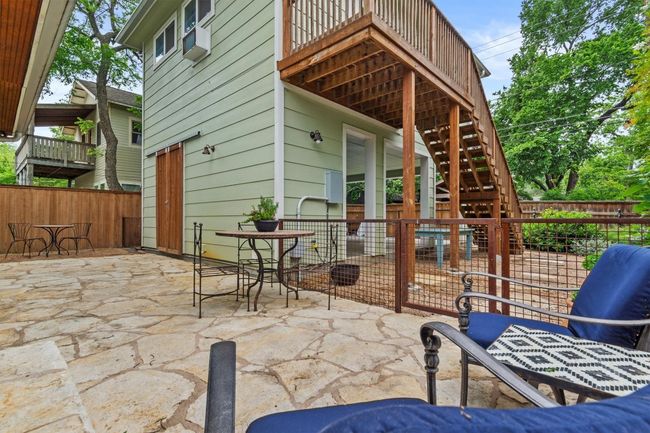 CASITA ADU: View of rear patio showing stairway to apartment. | Image 24