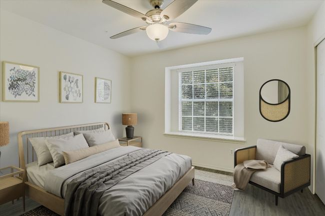 Virtually Staged Bedroom with wood finished floors and ceiling fan | Image 6