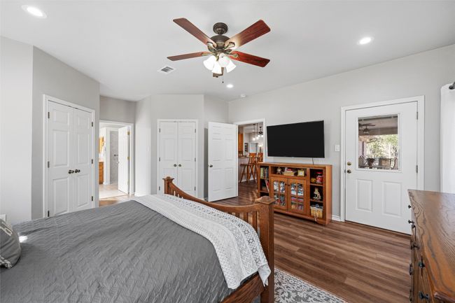 Separate Walk-in closets and private rear patio door | Image 25