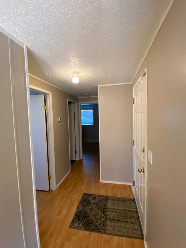 154 Wildrose Court, Home with 3 bedrooms, 2 bathrooms and 2 parking in Brooks AB | Image 4