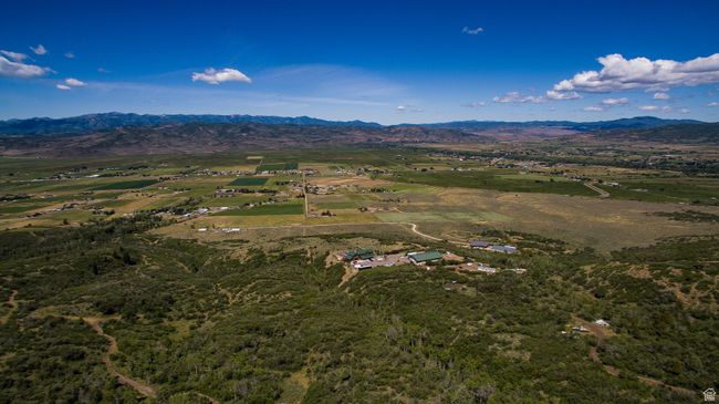 Birds eye view of property featuring a rural view and a mountain view | Image 15