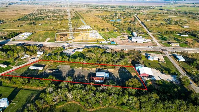 Located just off Highway 36 in Damon, this versatile property offers endless possibilities for business or investment. | Image 30