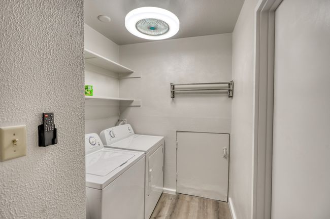 Clothes washing area with washer and dryer in lower unit | Image 14