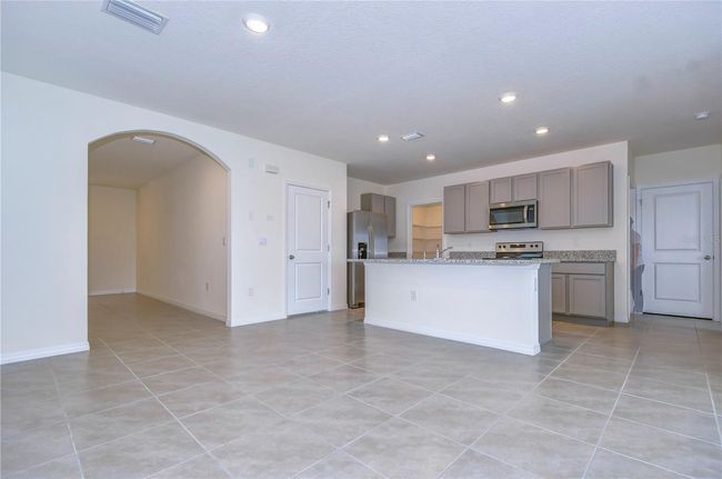 9176 Forge Breeze Loop, House other with 5 bedrooms, 3 bathrooms and null parking in WESLEY CHAPEL FL | Image 7
