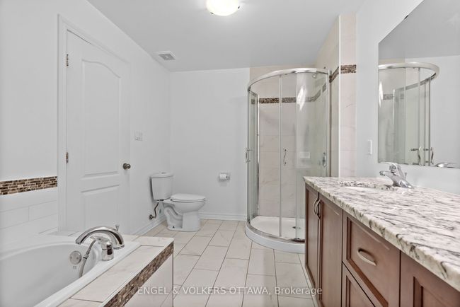 182 Meandering Brook Dr, House attached with 4 bedrooms, 4 bathrooms and 2 parking in Gloucester ON | Image 27
