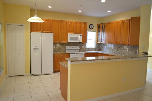 11117 Kapok Grand Cir, MADEIRA BEACH, FL, 33708-3015 | Card Image