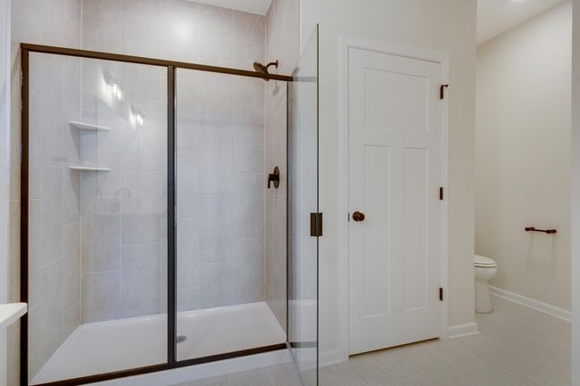 Owner's walk-in shower and linen closet | Image 19