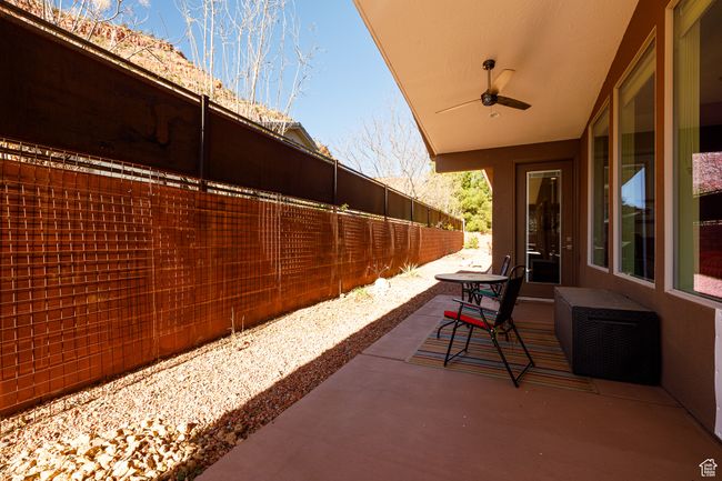 View of patio featuring fence and ceiling fan | Image 31