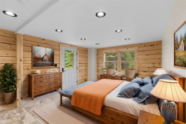 Virtual staged main level Bedroom | Image 24