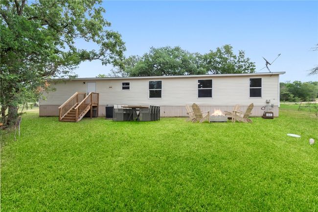 Back of property with a lawn | Image 5
