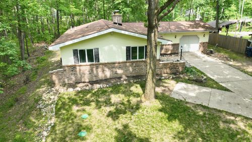 1207 Queens Way, Weidman, MI, 48893 | Card Image