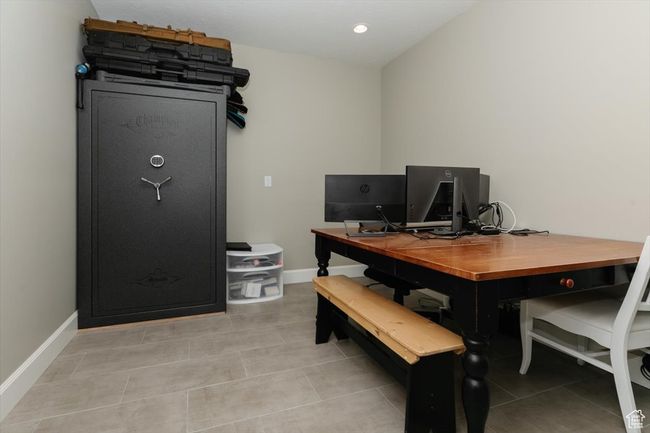 Home office featuring baseboards and light tile patterned floors | Image 62