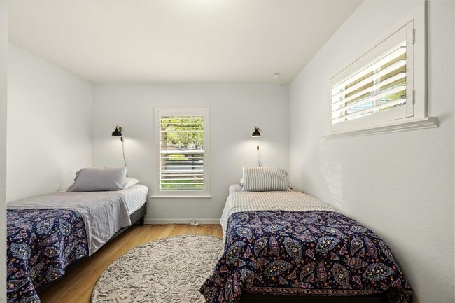 The second bedroom also offers windows on 2 walls. | Image 18