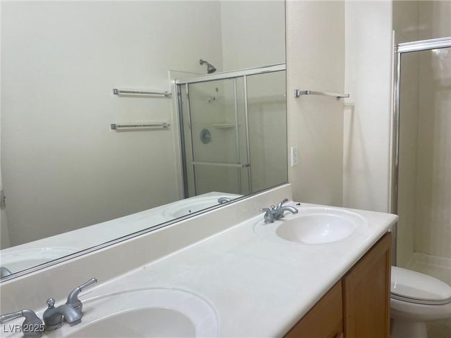 Full bathroom with a stall shower and double vanity | Image 22