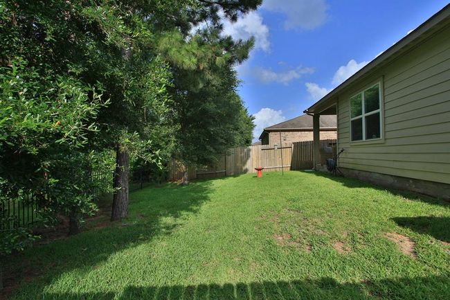 7551 Fettle Ln, House other with 3 bedrooms, 2 bathrooms and 2 parking in Conroe TX | Image 39
