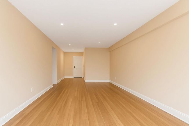 Spare room with light wood-style floors and recessed lighting | Image 12