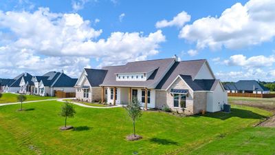 View of front of home featuring central air condition unit and a front yard | Image 3