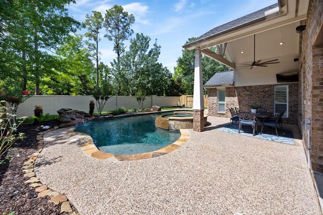 Gorgeous backyard with no back neighbors includes two covered porches for entertaining year-round. | Image 43