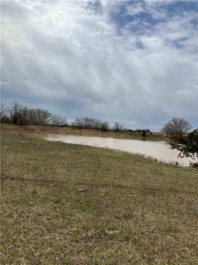 View of yard with a water view | Image 18