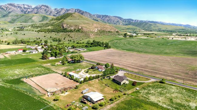 Aerial overview of property's location featuring rural landscape and a mountain backdrop | Image 32