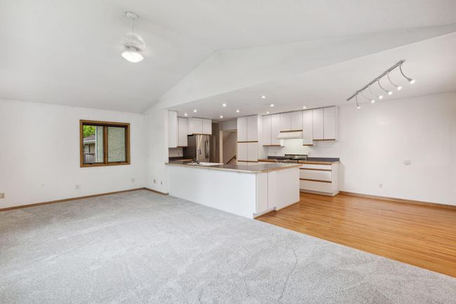 New carpet in family room. | Image 14