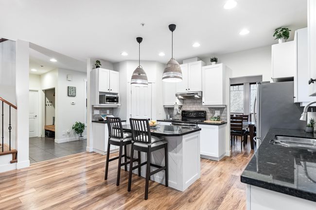 Kitchen & Island Open to Great Room | Image 12