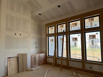 Vaulted ceiling with wood beams. | Image 3