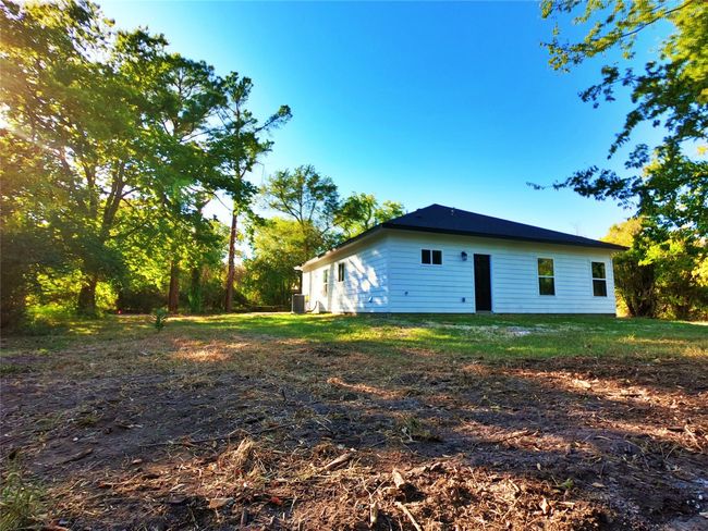 Back of house featuring central AC unit | Image 17