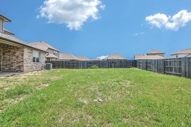 View of yard with central air condition unit | Image 30