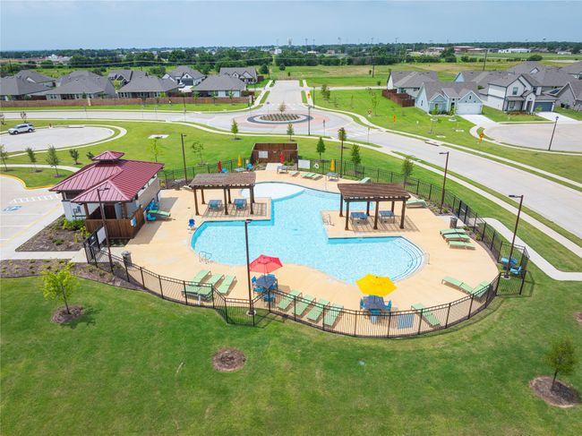 Community pool with a residential view | Image 35
