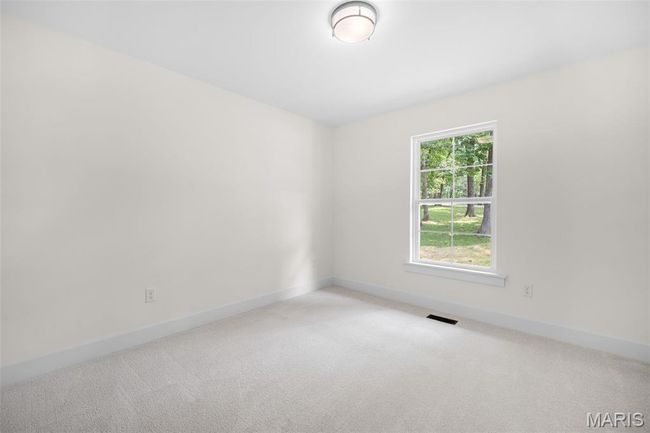 Unfurnished room featuring carpet floors and baseboards | Image 30
