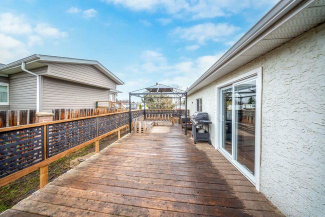 40 Hearthstone Dr, House other with 3 bedrooms, 2 bathrooms and 2 parking in Lacombe AB | Image 4